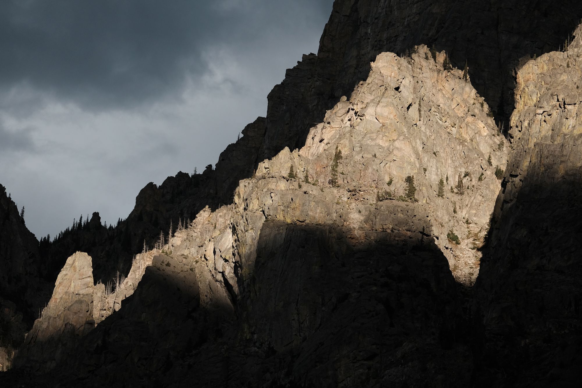 Dramatic Sunlight on a rock cliff.