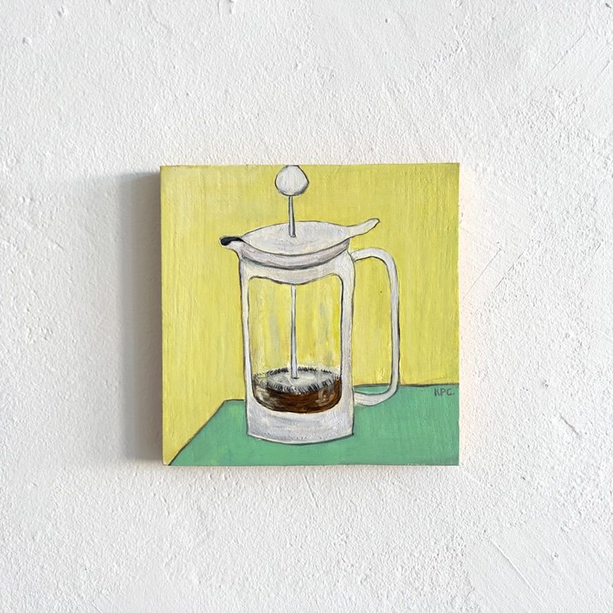 A painting of a white french press coffee maker on a yellow background and sea foam green counter.